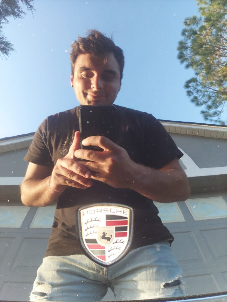 Ceramic Coating Orlando reflection of Porsche after paint correction