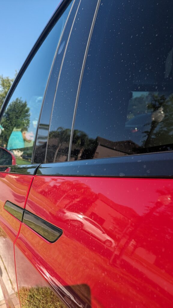 Tesla model X before paint correction in Orlando fl