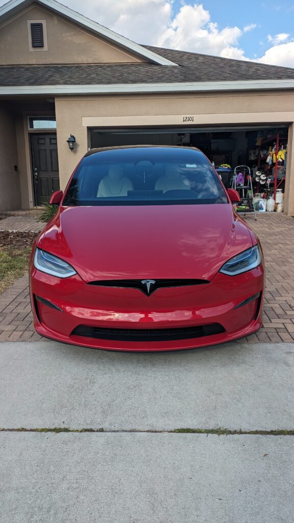 Tesla Model X after professional paint correction in Orlando Florida